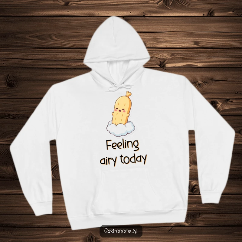 Funny hoodie featuring a pleased baguette character floating on a steam cloud, offering warmth and a dash of delicious, lighthearted fun.