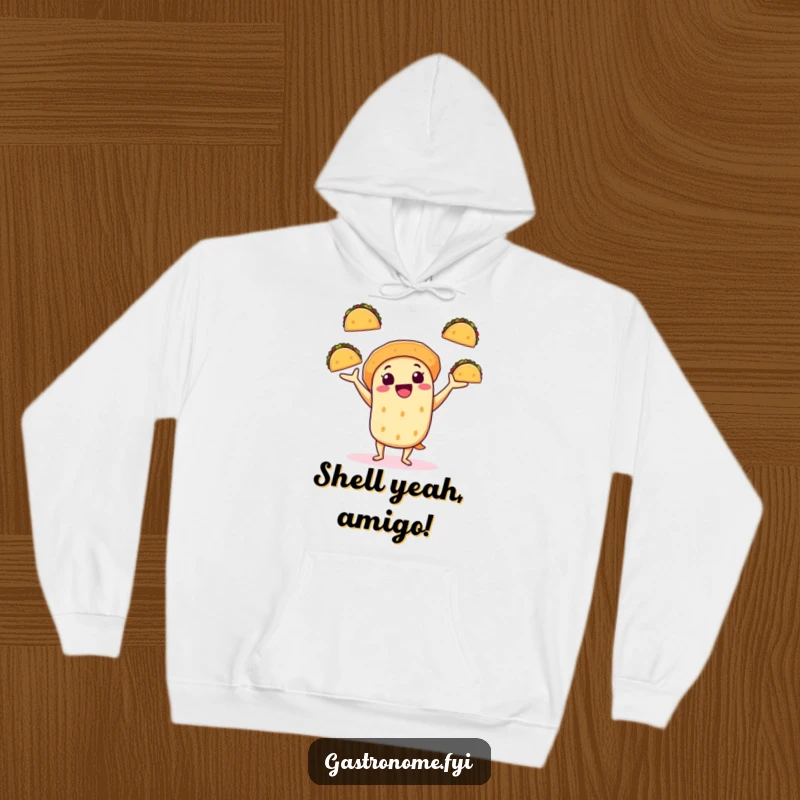 Funny hoodie featuring a cheerful taco character juggling mini tacos, offering cozy comfort and vibrant fiesta energy.